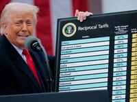 President Donald Trump holds up a chart of "reciprocal tariffs".