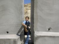 articles/2013/02/13/the-world-according-to-bds/girl-barrier-openz_awmolt