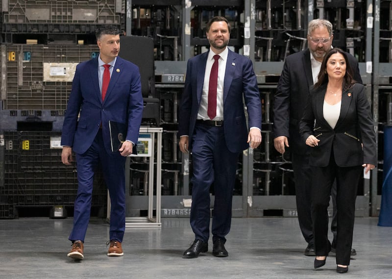 HOWELL, MICHIGAN - SEPTEMBER 17: Vice President JD Vance (2nd from left)) tours Hatch Stamping with US Congressman Tom Barrett (R-MI)(L), Dan Craig, President and COO of Hatch Stamping (3rd L), and US Labor Secretary Lori Chavez-DeRemer on September 17, 2025 in Howell, Michigan. Vance spoke about tax cuts that were passed by Congress this year and how they would benefit businesses and families. (Photo by Bill Pugliano/Getty Images)