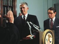 Archibald Cox sworn in as Special Watergate Prosecutor by Judge Charles Fahy of the District of Columbia Circuit Court with Attorney General Elliot Richardson witnessing