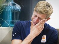 Netherlands volleyball player and convicted child rapist Steven van de Velde cries while speaking to the media about being booed during the Paris Olympics.