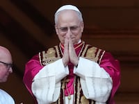 The newly elected Pontiff, Pope Leo XIV is seen for the first time from the Vatican balcony on May 8, 2025 in Vatican City, Vatican.