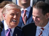 WASHINGTON, DC - MAY 11: U.S. President Donald Trump jokes with Head Coach Curt Cignetti during an event to celebrate the 2026 Football National Champion Indiana Hoosiers football team on the South Lawn of the White House on May 11, 2026 in Washington, DC. The Indiana Hoosiers defeated the Miami Hurricanes 27-21 to win their first-ever College Football Playoff National Championship on January 19, 2026. (Photo by Kevin Dietsch/Getty Images)