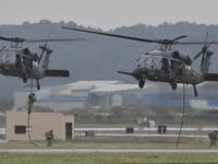 US soldiers participate in a military tactical demonstration during "Air Power Day" preview at US Osan Air Base in Pyeongtaek on September 20, 2019.