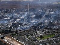 An aerial image taken on Aug. 10, 2023, shows destroyed homes and buildings burned to the ground in Lahaina in the aftermath of wildfires in western Maui, Hawaii.