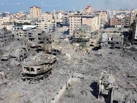 A view shows houses and buildings destroyed by Israeli strikes in Gaza City, Oct. 10, 2023.
