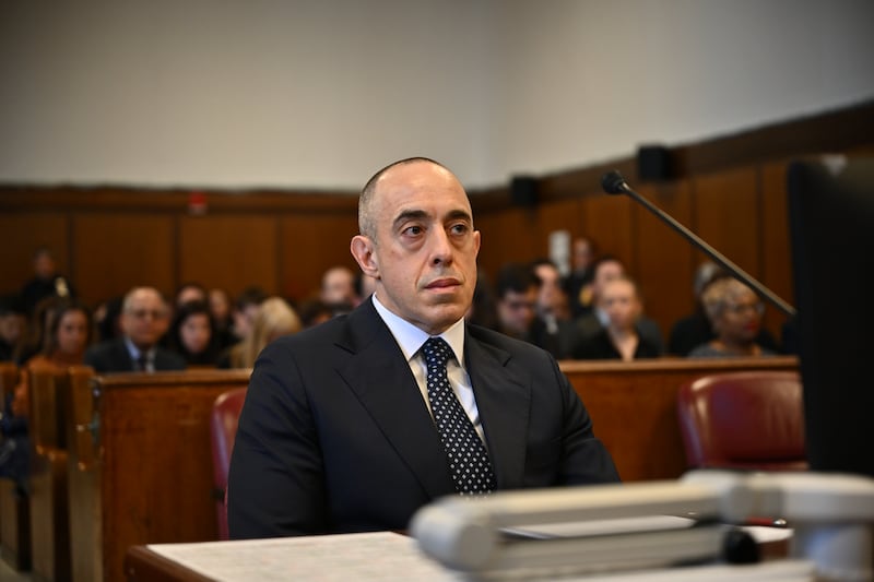 NEW YORK, NEW YORK - JANUARY 10: Trump attorney Emil Bove looks on as US President-elect Donald Trump appears remotely for a sentencing hearing in front of New York State Judge Juan Merchan with his attorney Todd Blanche (L) at Manhattan Criminal Court on January 10, 2025 in New York City. The U.S. Supreme Court rejected President-elect Donald Trump’s last-minute bid to halt his sentencing in the criminal hush-money case. Trump was found guilty on all 34 felony counts of falsifying business records, becoming the first former U.S. president to be convicted of felony crimes.(Photo by Angela Weiss - Pool/Getty Images)