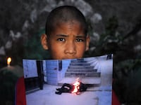 articles/2012/12/12/tibet-persecution-marital-shame-why-people-burn-themselves-to-death/self-immolation-sepkowitz-main_t9oa2d
