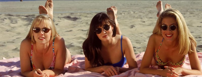 Jennie Garth’s and Shannen Doherty’s on-screen tension translated into their real lives. Pictured here with Tori Spelling on the set of "Beverly Hills, 90210."