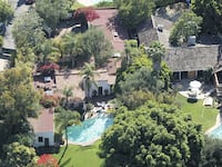 A welathy heiress and a reality TV producer are suing the city of Los Angeles for the right to demolish the house where Marilyn Monroe died.
