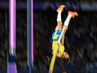 Mondo Duplantis of Sweden vaults to a new world record during the men's pole vault final at the at the 2024 Olympic Games in Paris on August 5, 2024.