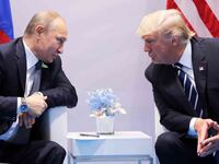 Russia's President Vladimir Putin talks to U.S. President Donald Trump during their bilateral meeting at the G20 summit in Hamburg, Germany July 7, 2017. REUTERS/Carlos Barria - RC12A0EC47F0