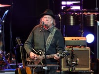 LOS ANGELES, CALIFORNIA - APRIL 26: Neil Young performs onstage during the Light Up The Blues 7 Concert celebrating Autism Speaks' 20th Anniversary at the Greek Theatre on April 26, 2025 in Los Angeles, California. (Photo by Kevin Winter/Getty Images)
