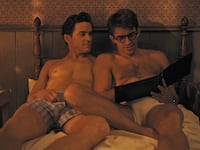 Alt text: Matt Bomer as Hawkins “Hawk” Fuller and Jonathan Bailey as Tim in FELLOW TRAVELERS