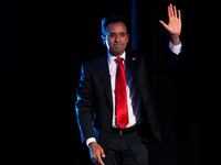 Republican presidential candidate Vivek Ramaswamy waves to the crowd at Erick Erickson's conservative political conference.
