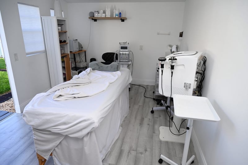 Medical beds and supplies that were found in the backyard 'med spa'.