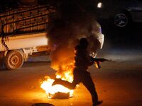 articles/2012/03/27/syrian-rebels-caught-embellishing-on-tape/syria-journalist-fake-footage-giglio_z2tdff