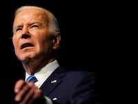 President Joe Biden speaks at an NAACP event in Detroit.
