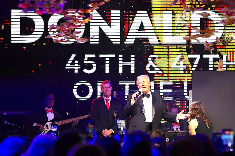 U.S. President Donald Trump speaks to guests during a New Year’s Eve event