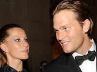 Gisele Bundchen (L) and Tom Brady.