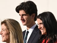 BOSTON, MASSACHUSETTS - DECEMBER 02: Ambassador Caroline Kennedy, Tatiana Schlossberg and Jack Schlossberg wait to greet Prince William, Prince of Wales during his visit to John F. Kennedy Presidential Library and Museum on December 02, 2022 in Boston, Massachusetts. The Prince and Princess of Wales are visiting the coastal city of Boston to attend the second annual Earthshot Prize Awards Ceremony, an event which celebrates those whose work is helping to repair the planet. During their trip, which will last for three days, the royal couple will learn about the environmental challenges Boston faces as well as meeting those who are combating the effects of climate change in the area. (Photo by Karwai Tang/WireImage)