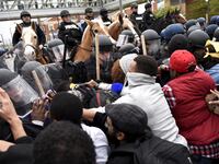 articles/2015/04/27/the-bloods-and-crips-anti-cop-ceasefire-in-baltimore/150426-briquelet-baltimore-gang-cops-tease_ovrw32