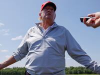Former U.S. President Donald Trump talks with reporters as he participates in the Pro-Am tournament, ahead of the LIV Golf Invitational, at the Trump National Golf Club in Sterling, Virginia, U.S. May 25, 2023.