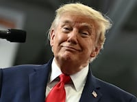 US President Donald Trump smiles as he finishes his speach during a campaign rally at Curtis D. Menard Memorial Sports Center in Wasilla, Alaska, on October 13, 2026. (Photo by Kent NISHIMURA / AFP via Getty Images)