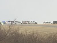 Authorities at Ingalls Field Airport in Virginia where a private jet crashed, killing five people on board.