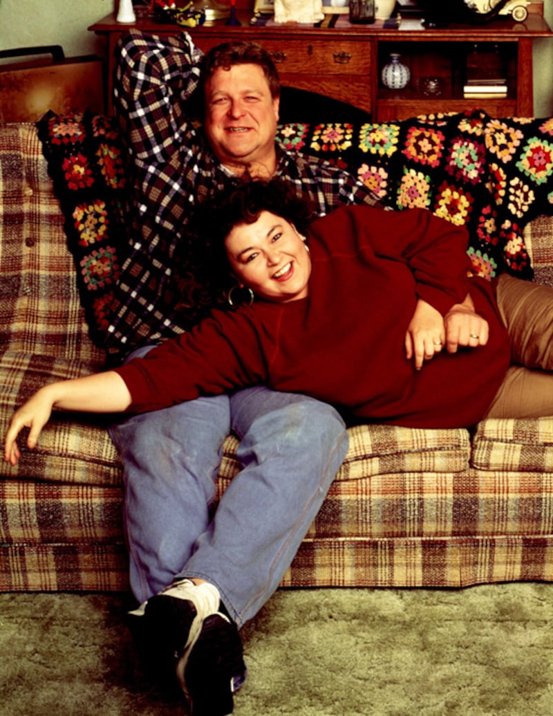 <p>Dan (John Goodman) and Roseanne (Roseanne Barr) Conner became household icons in 1988 when Barr's self-titled show premiered. The series featured a nuclear family that included daughters Darlene (Sara Gilbert) and Becky (Alicia Goranson, Sarah Chalke), son D.J. (Michael Fishman), and Roseanne's sister Jackie (Laurie Metcalf). Although they often joked about abandoning their children and made sarcastic jokes at their expense, Roseanne and Dan tried to do right by their offspring. The two worked a series of blue-collar jobs throughout the show, struggling to pay their bills.
<a href="http://www.ew.com/ew/article/0,,287723,00.html" target="_blank">Entertainment Weekly</a> called the series, "the most groundbreaking kitchen-sink sitcom since
<i>All in the Family</i>" and said, "Goodman's portrayal of a belching, poker-playing man's man who's a flop at breadwinning (drywaller, motorcycle-shop owner) yet a loving, sensitive husband and father has been remarkable for its thrown-away subtlety."</p>