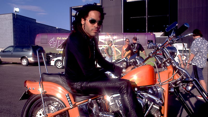 Portrait of American musician Lenny Kravitz sitting on a motorcycle in Chicago, Illinois on June 7, 1996.