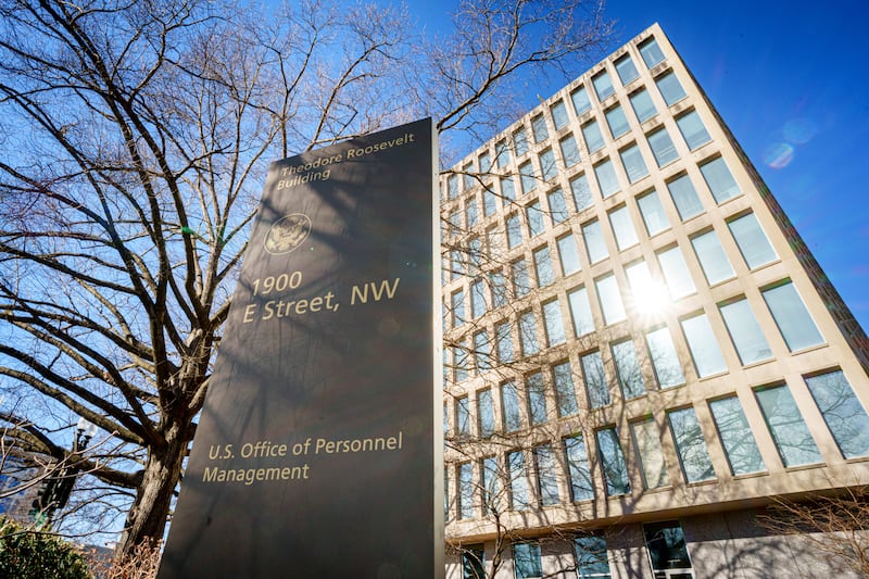 WASHINGTON, DC - JANUARY 29: A sign marks the location of the U.S. Office of Personnel Management (OPM) headquarters building on January 29, 2025, in Washington, DC. (Photo by J. David Ake/Getty Images)