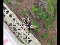 A 19-year-old male had fallen approximately 400 feet down the side of the canyon at the High Steel Bridge.