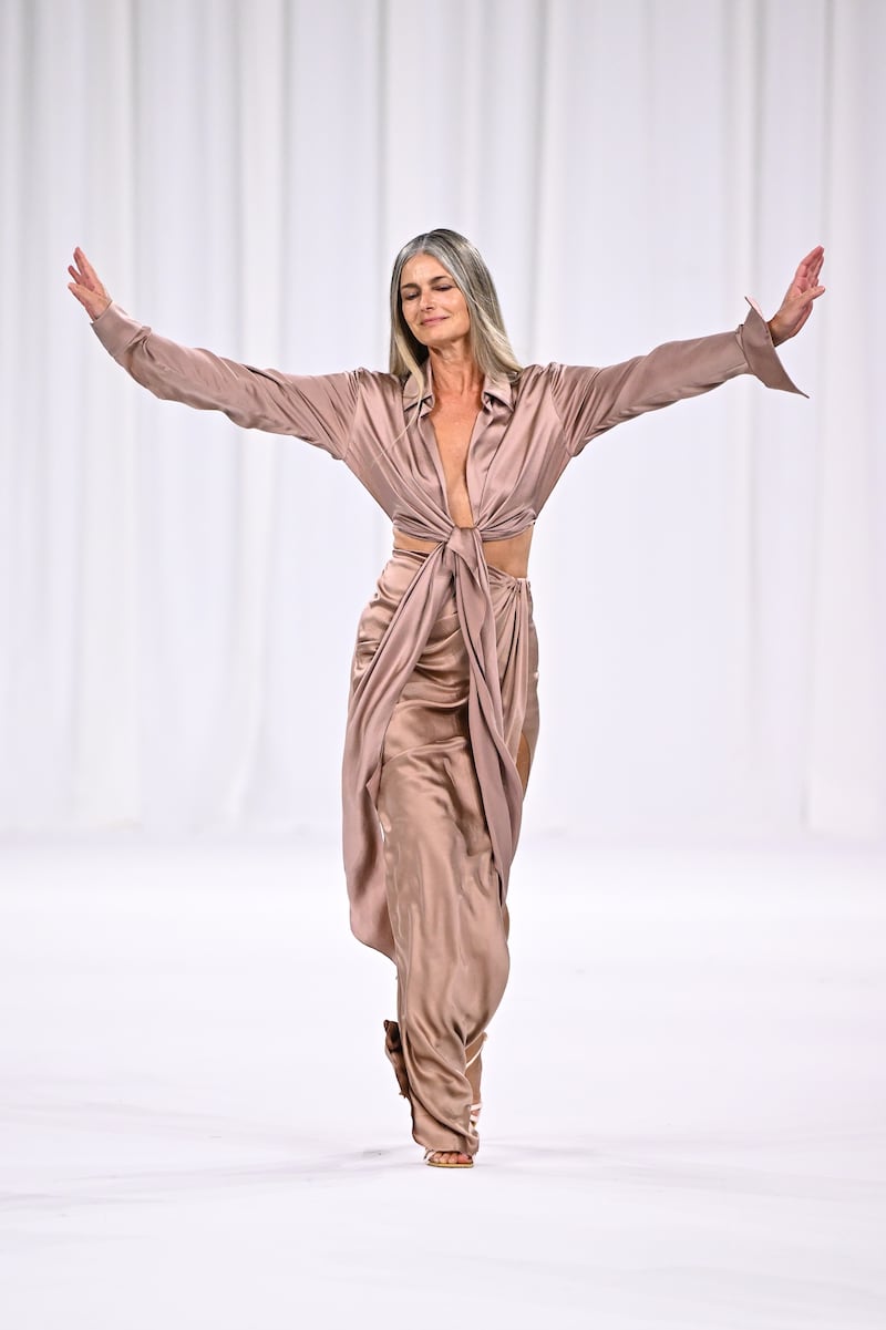 Paulina Porizkova has been modeling for almost 50 years. Here walking at Paris Fashion Week in the Balmain Womenswear Spring-Summer 2025 show.