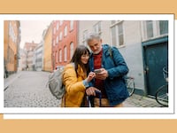 Travelers using the Babbel language learning app on a smartphone while exploring a European city.