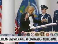 President Donald Trump dances with a sword at the Commander in Chief Ball after his January 20, 2025 inauguration.