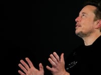 Tesla and SpaceX's CEO Elon Musk reacts during an in-conversation event with British Prime Minister Rishi Sunak in London