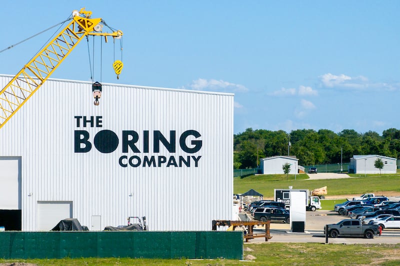BASTROP COUNTY, TEXAS - APRIL 21: In an aerial view, the Boring Company facility is seen near the premises of Tesla CEO Elon Musk's Snailbrook town on April 21, 2025 in Bastrop, Texas. The small company town of Snailbrook is built on 3,500 acres of land and serves as a base that houses employees of The boring Company and SpaceX. (Photo by Brandon Bell/Getty Images)