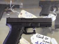 articles/2015/05/13/how-states-like-georgia-make-cop-killing-easy/150512-shechter-guns-tease_lxtvix