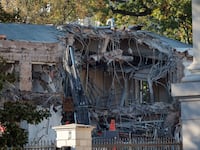 The facade of the East Wing of the White House is demolished by work crews on October 20, 2025 in Washington, D.C..