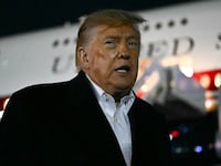 President Donald Trump speaks to the media after disembarking from Air Force One at Joint Base Andrews, Maryland on October 26, 2026.