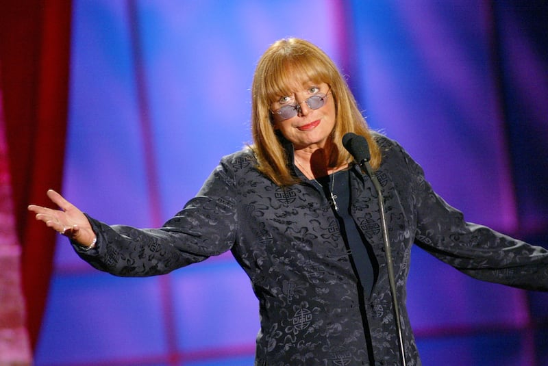Penny Marshall presents an award at the Women In Film's Crystal and Lucy Awards in Los Angeles in 2002.