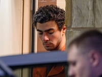 Suspected shooter Luigi Mangione is led from the Blair County Courthouse after an extradition hearing December 10, 2024 in Hollidaysburg, Pennsylvania.
