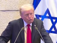 Trump's angry reaction as protesters interrupt his speech.
