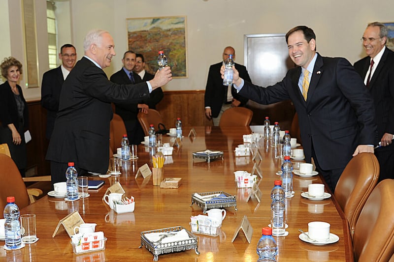 articles/2013/02/21/marco-rubio-really-loves-israel-and-has-pictures-to-prove-it/130221-rubio-netanyahu-tease_qtocku