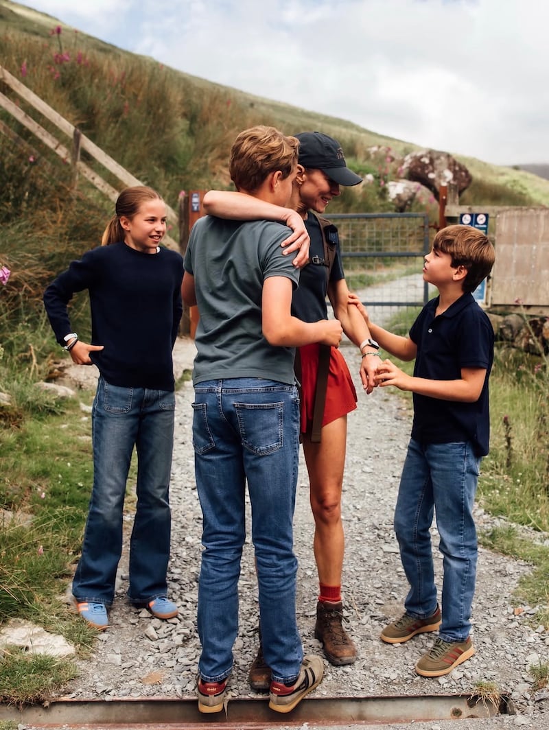 In one of the pictures, 12-year-old Prince George appeared to be the same height as his mother.