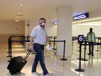 Ted Cruz coming back from Cancun, Mexico.