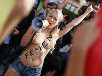 articles/2014/02/23/femen-s-topless-sextremists-invade-the-us/140222-femen-tease_p0yesh
