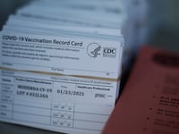 2021-01-24T004753Z_1446808503_RC20EL9QK5TR_RTRMADP_3_HEALTH-CORONAVIRUS-VACCINES_l7j3nd