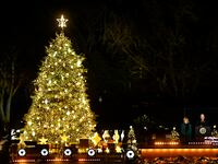 First Lady Jill Biden and President Joe Biden talk during the 100th National Christmas Tree Lighting Ceremony November 30, 2022 in Washington, DC.